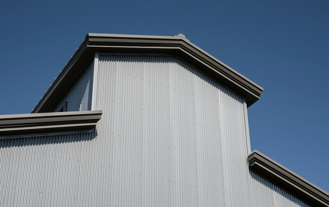 Silver metal agricultural building; panel-metal design inspiration, not a BRS project