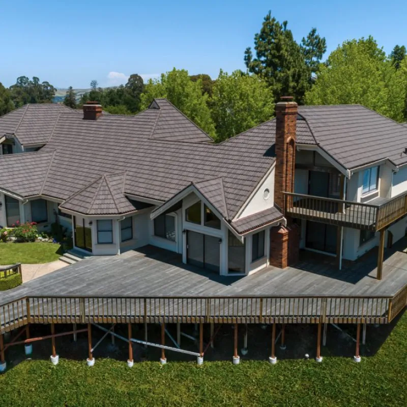 Unified Steel Pacific Tile in Timberwood; manufacturer inspiration, not a BRS project